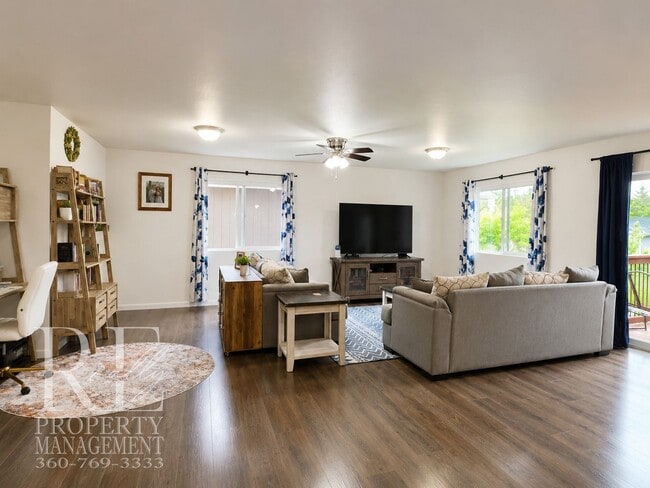 Photo - Spacious 3-Story Home with Flexible Living Space, Heat Pump & Private Deck Retreat