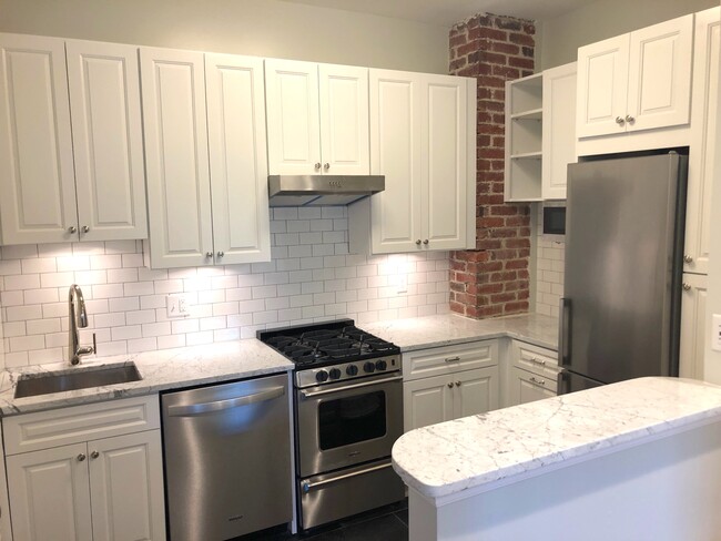 Renovated kitchen - 201 E St SE Apartment Unit 4