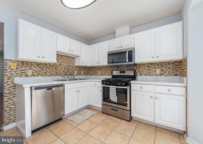 Building Photo - 5971 Millrace Ct Unit E102