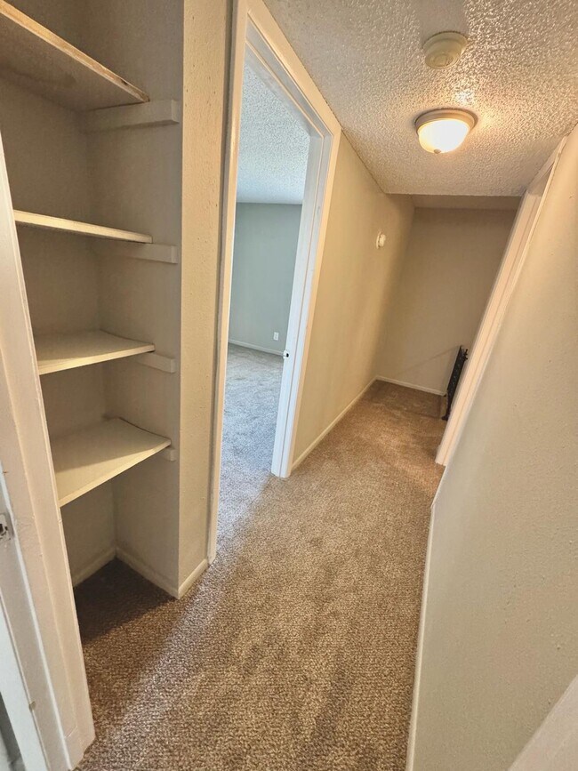 Upstairs Hall Looking Into Smaller Bedroom