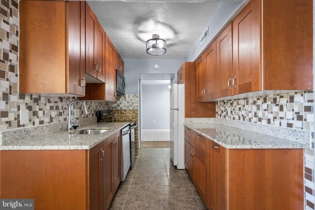 Photo - 7812 Hanover Pkwy Apartment Unit 201
