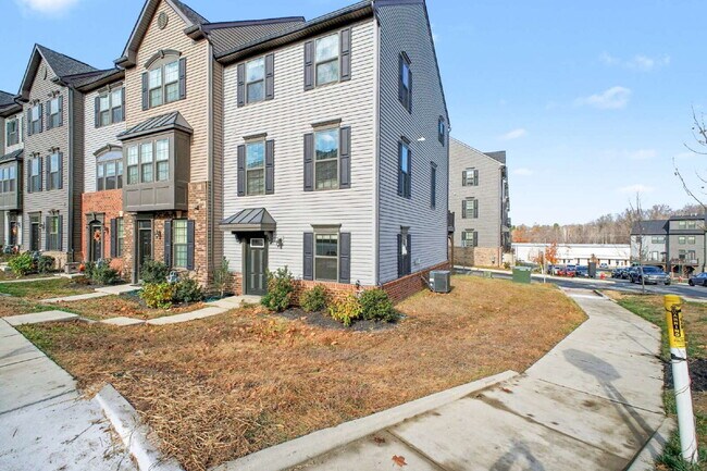 Photo - **Special Move-in Offer**  $500 off of the first month's rent.

Exceptional 3-Level Corner Unit T...