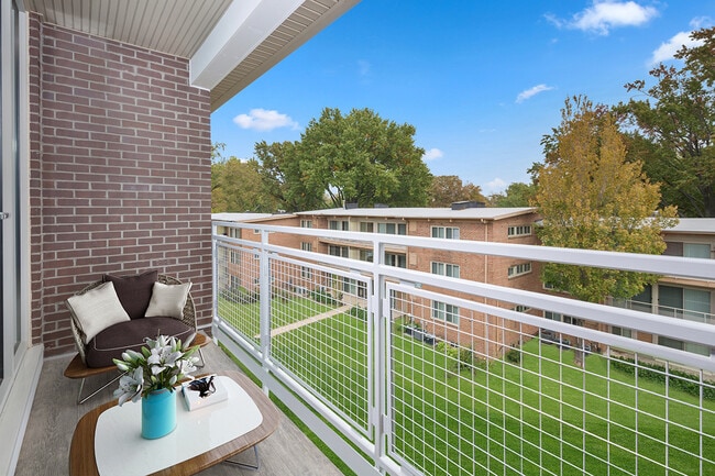 Relaxing balcony at Flower Branch Apartments in Silver Spring, MD