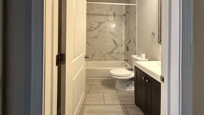 Photo - Modern 3-Bed, 1.5-Bath Rental with Updated Finishes