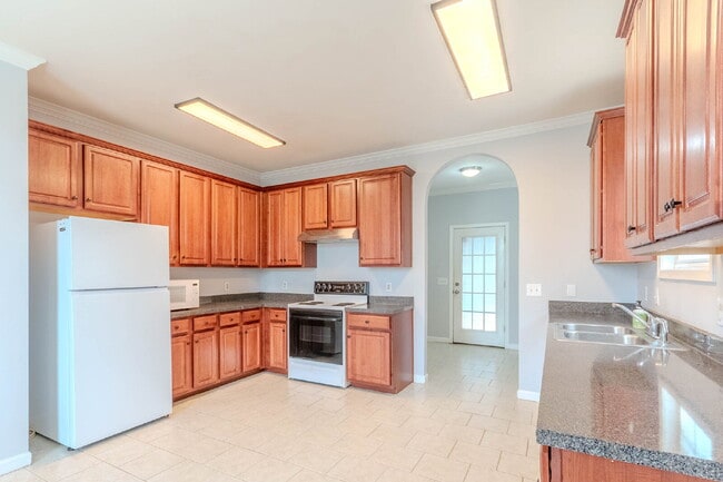3 bed, 2.5 bath brick home across from Ted Rhodes Golf Course