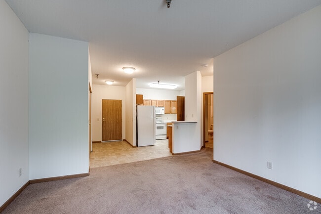 1BR, 1BA - 725SF - Living Room, Dining and Kitchen