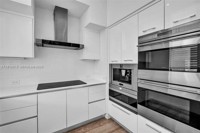 Building Photo - 9501 Collins Ave