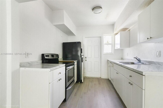 Photo - 1050 98th St Unidad 4W