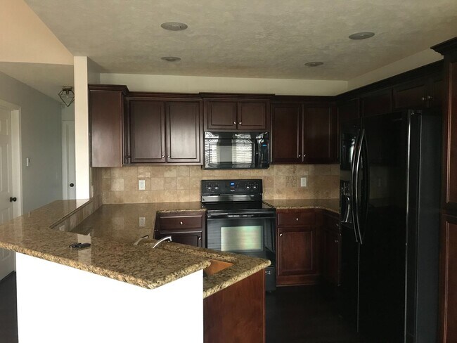 Photo - 3 bedroom 2 bath house.  Fenced yard