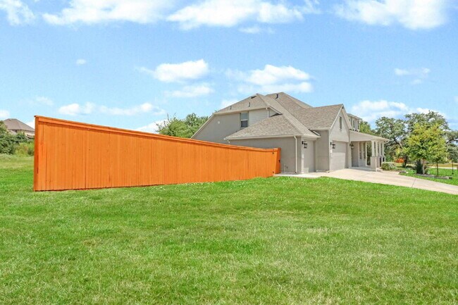 ASK ABOUT FREE APPLICATIONS THROUGH AUGUST!

"Spacious 4-Bedroom Sanctuary with Cozy Fireplace in...