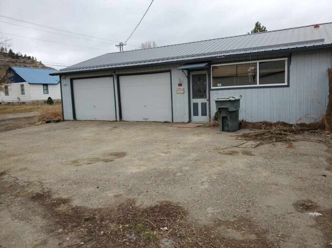 Photo - Small Living with Large Garage