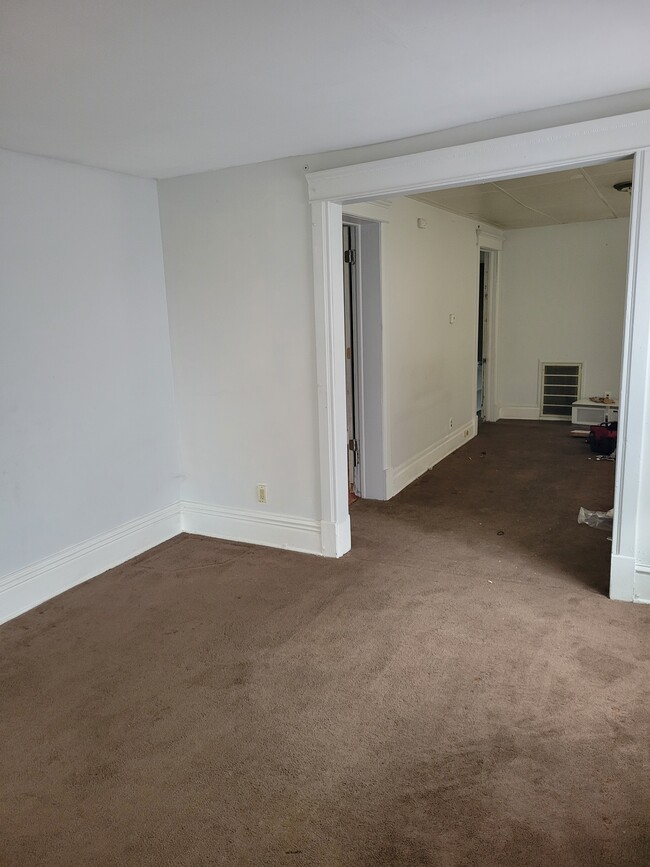 Living Room/Dining Area - 209 Richards St Apartments