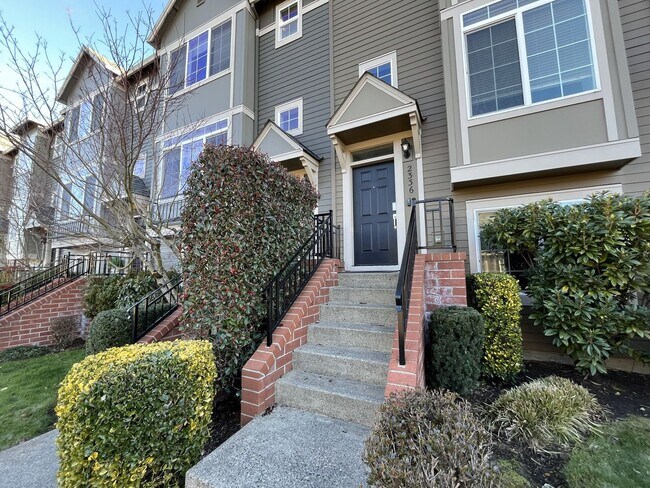 Photo - Bright 3-Level Townhome with Open-Concept Living, Built-In Fireplace & Included Wi-Fi