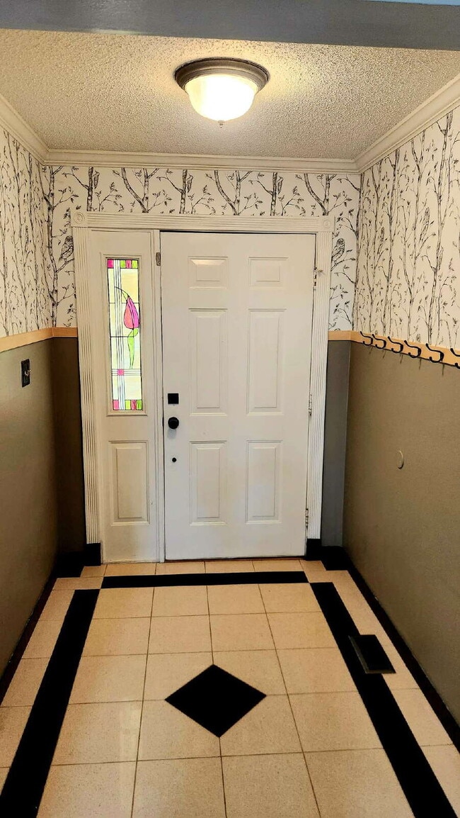 Photo - "Charming 3-Bed Oasis with 2.5 Baths on Carrington Court!"