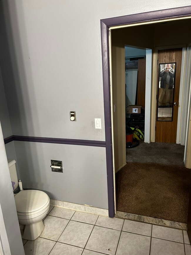 Bathroom looking into hall