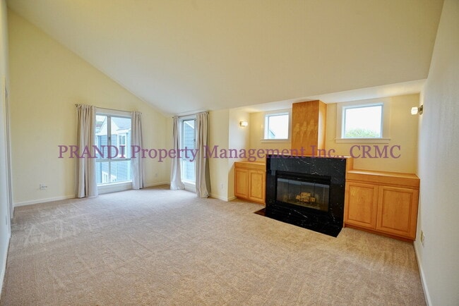 Photo - Wood burning fireplace in this updated 2 b... Unit Apt 2