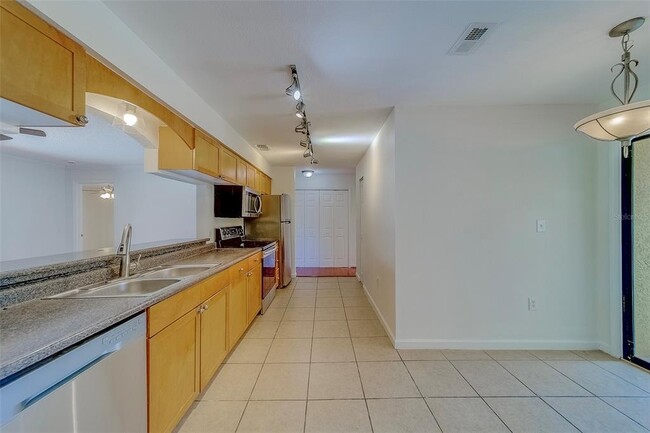 Photo - 10195 Sailwinds Blvd N Unit 202