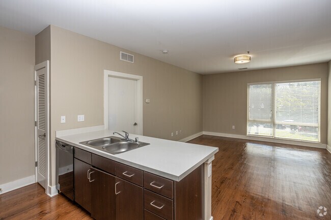 1BR, 1BA - 610 SF - Kitchen & Living Room - Park Edge Apartments
