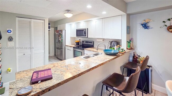 Photo - 8590 SW 212th St Unidad 107