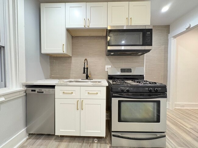 Photo - 5836 Phillips Ave Unit Apartment 1