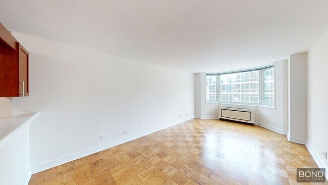 Building Photo - 400 E 71st St Unit 21K Rental