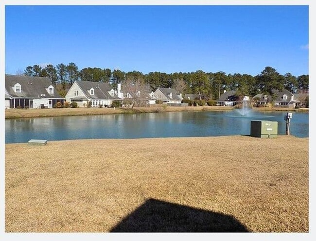 Photo - Spacious Condo with Expansive Pond Views