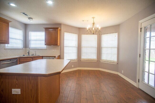 Photo - "Spacious 4-Bed Home with Granite Touch & Cozy Fireplace in Springdale!"