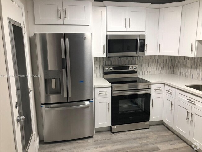 Building Photo - 5425 SW 77th Ct Unit 212D Rental