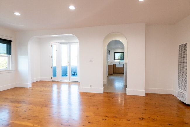 Living Area w/ view to french doors to deck