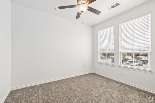 3BR, 2BA - 1,070SF - Primary Bedroom