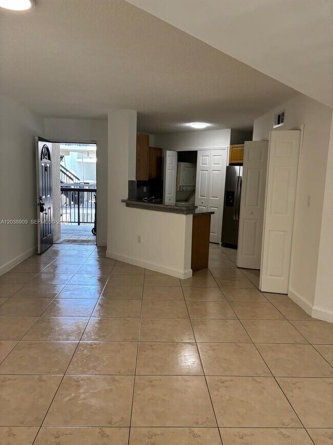 Building Photo - 6276 NW 186th St Unit 204
