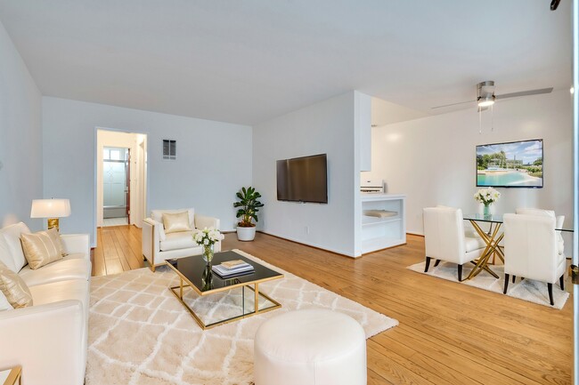 Staged living room and dining room - 218 Gale Properties Apartments