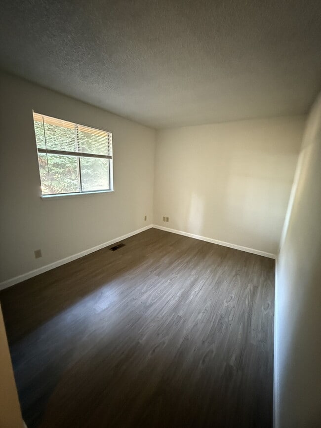 Photo - Charming 3-Bedroom Home with Cozy Fireplac...