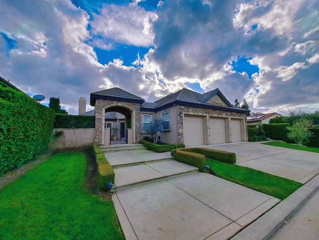 Photo - Custom Clovis Residence in Gated Community | Spacious Layout & 3-Car Garage!