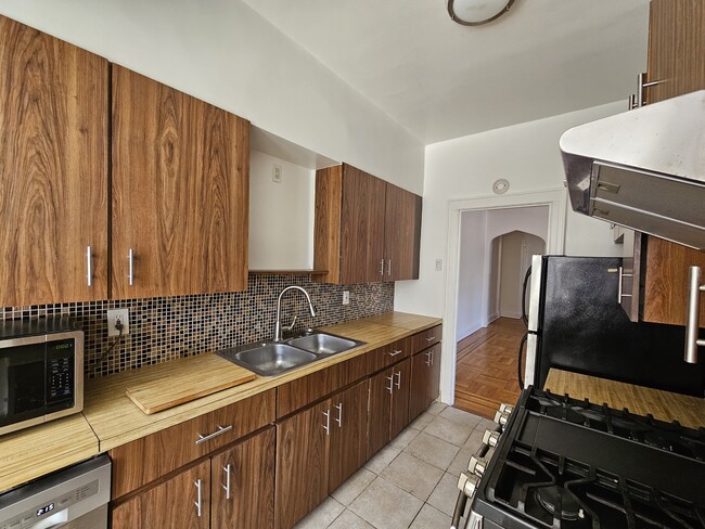 Photo - 8716 31st Ave Unit 2 BR/1BA APT W/Parking