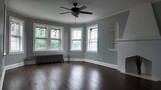 Building Photo - 7746 Tripp Ave Unit 3