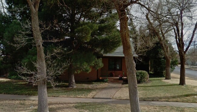 Building Photo - Massive Corner-Lot Home with Retro Charm & Shady Backyard!