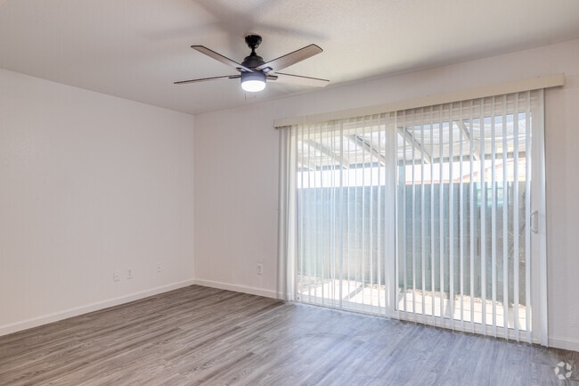 Living Room and Fenced Backyard