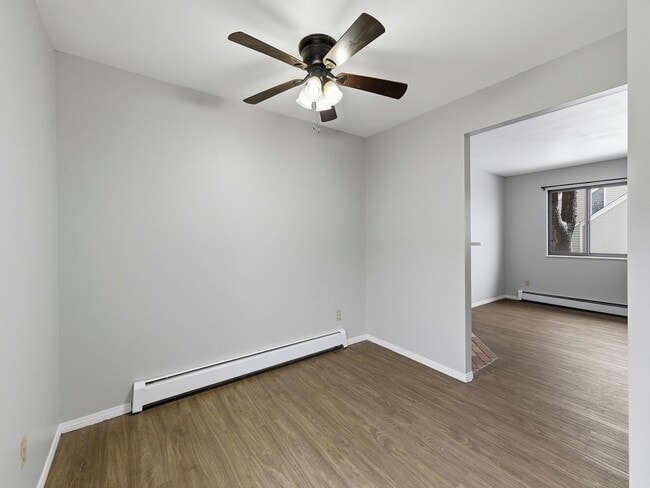 Photo - Spacious 2 Bed Condo W/ Bonus Basement Room, Fireplace & Garage Available NOW!