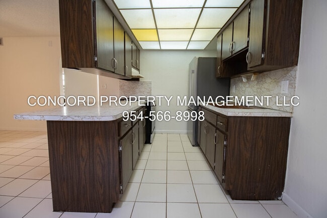 Photo - Spacious 2 Bedroom, 1 Bathroom- Pool - Laundry on Site- Fully Tiled- Central AC Unit 3