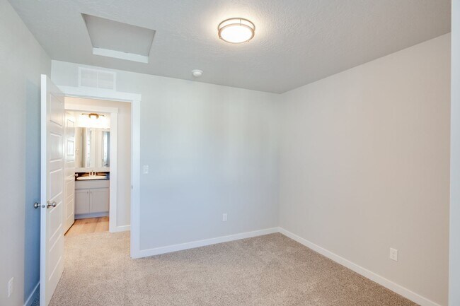 Photo - This  3 bedroom, 2.5 bathroom modern townhouse is ready for you!