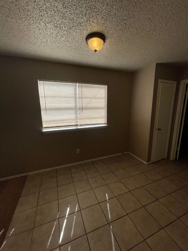 Photo - House Located Between W. Loop 289 & Marsha Sharp & Within One Block Of LCU Campus!