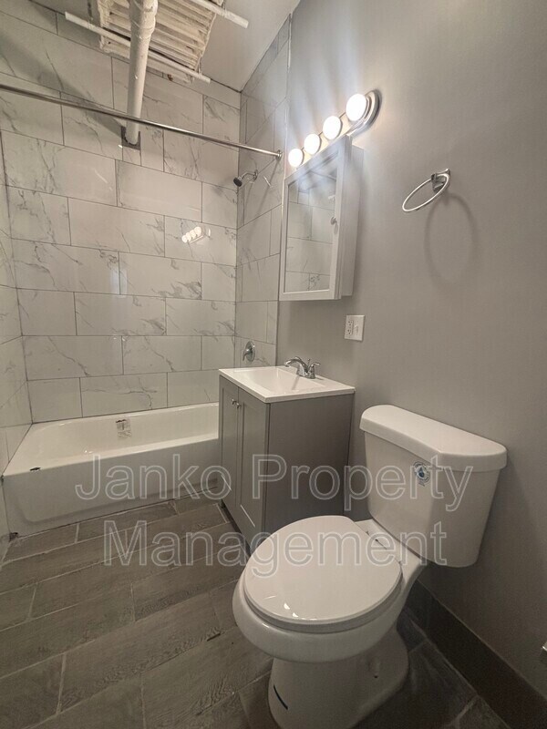Photo - 658 E 81st St Unit G