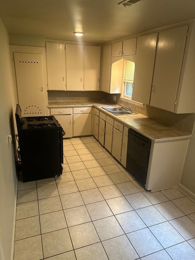 Photo - 3-Bed, 2-Bath Springdale Home with Split Floorplan and Large, Fenced-In Backyard