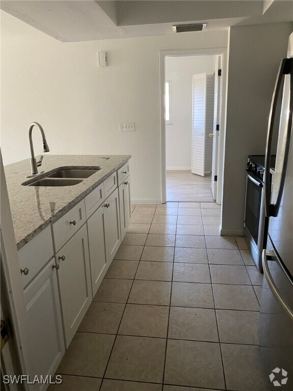 Building Photo - 919 Cape Coral Pkwy W Rental