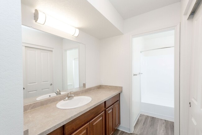 Modern Split Bathroom with Large Closet