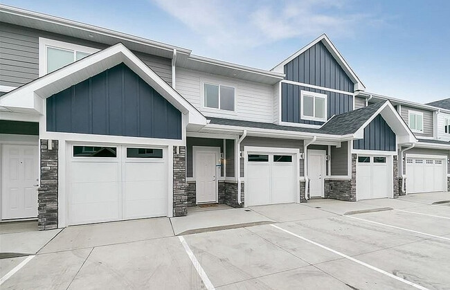 2-bedroom townhomes include a 1-car garage, and 3-bedroom townhomes include a 2-car garage.