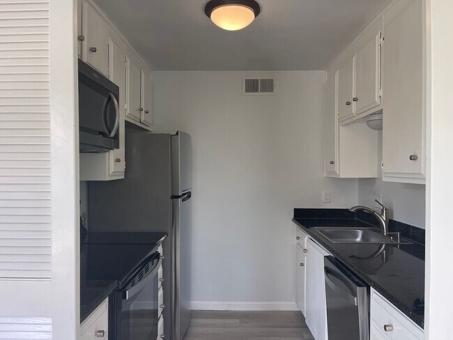 Photo - Gated & Remodeled 1br/1ba on Lake near Pool Unit 3