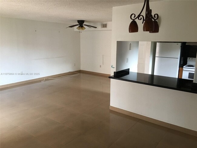 Building Photo - 5825 W 25th Ct Unit 304 Rental