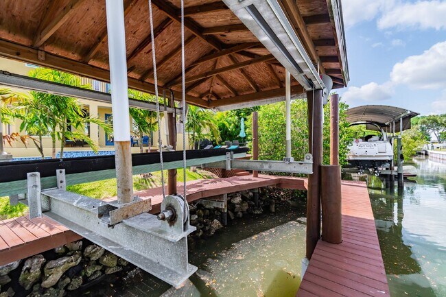 Photo - FURNISHED WATERFRONT 4 BED 3 BATH POOL HOM...